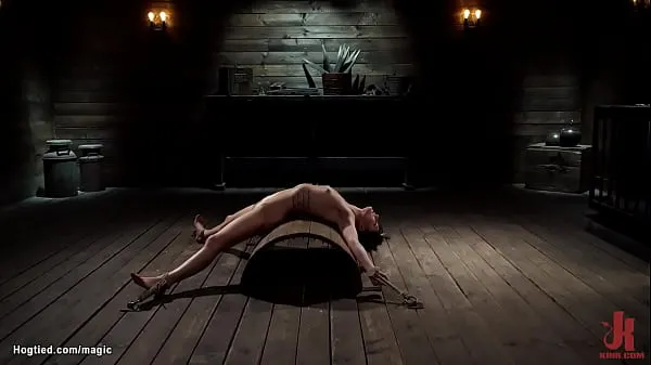 Slave laid and bound on half barrel Video hangat